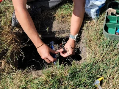Simmons-employee-repairing-an-irrigation-system